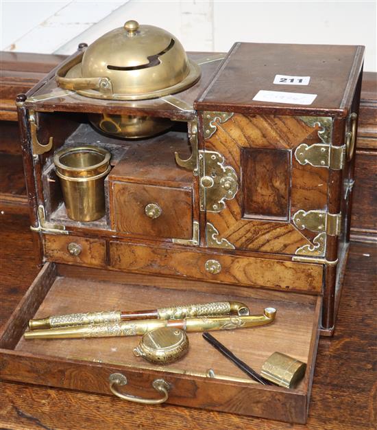 A Japanese elm and brass table cabinet length 30cm